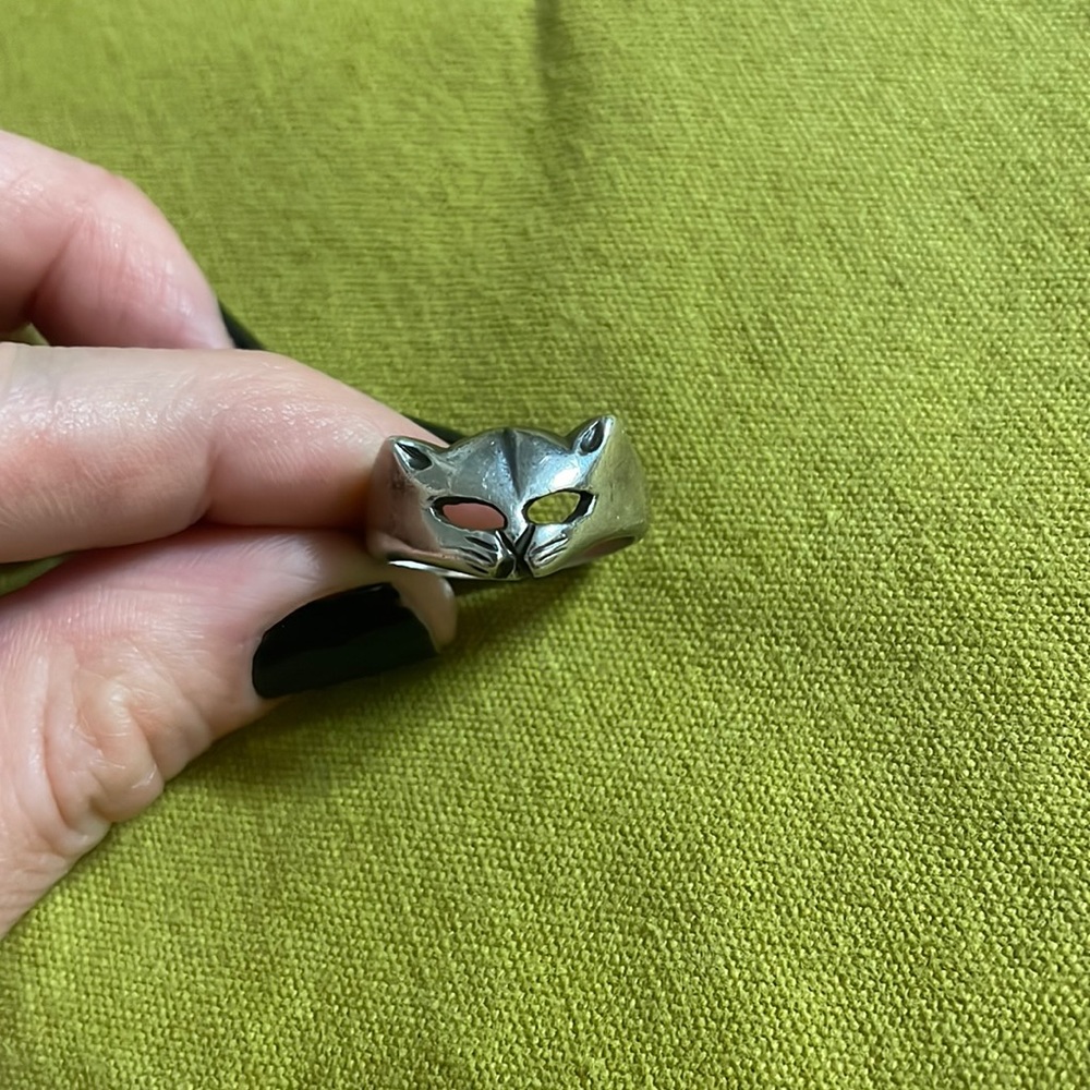 Sterling silver cat ring. Second photo is an attempt to show 925 stamp.